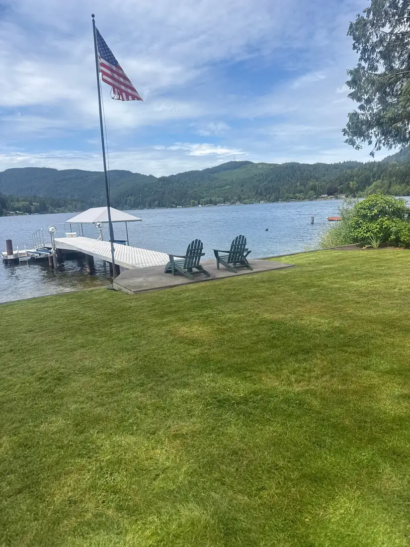 Lakefront lawn and dock surround